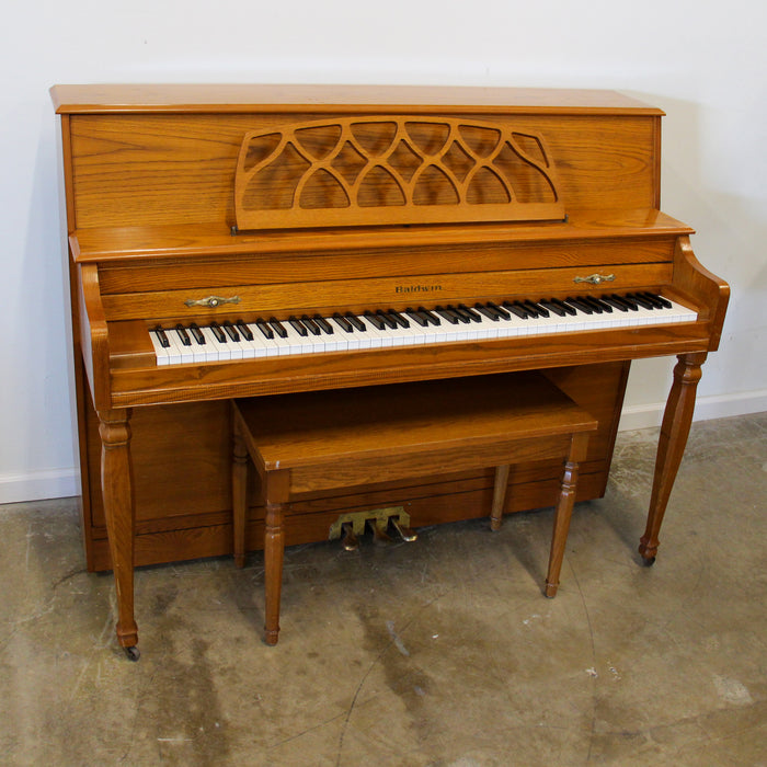 Baldwin 665 Oak Console Piano with bench